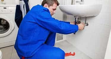Plumber Performing Bathroom Renovations — Plumbers & Electricians in Wollongong, NSW