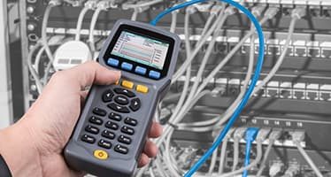 Electrician Testing Data Cables — Plumbers & Electricians in Nowra, NSW